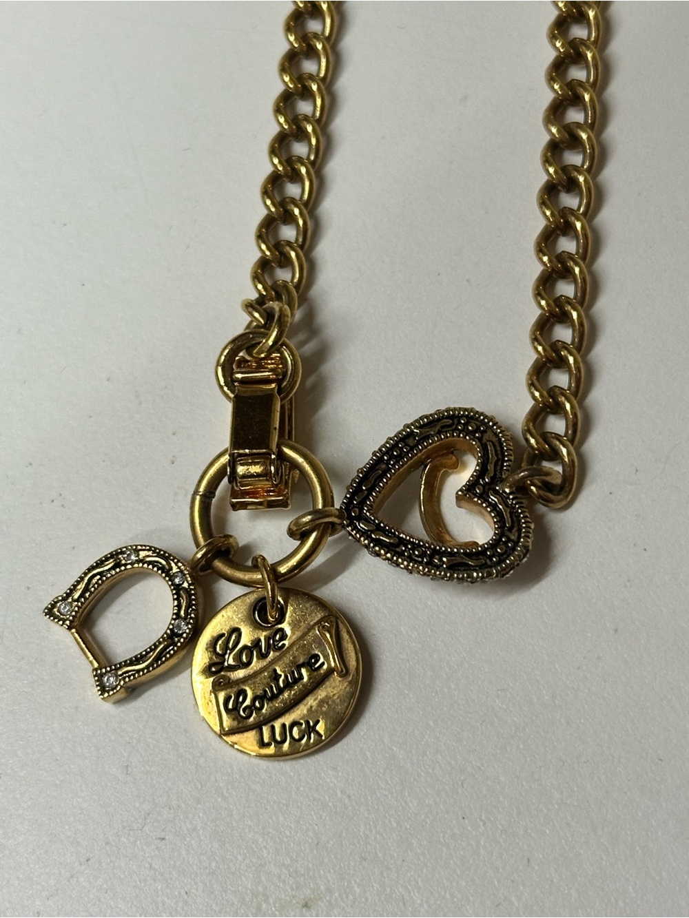 Juicy Couture Gold-Tone Charm Vintage Necklace with Hearts and Branded Disc